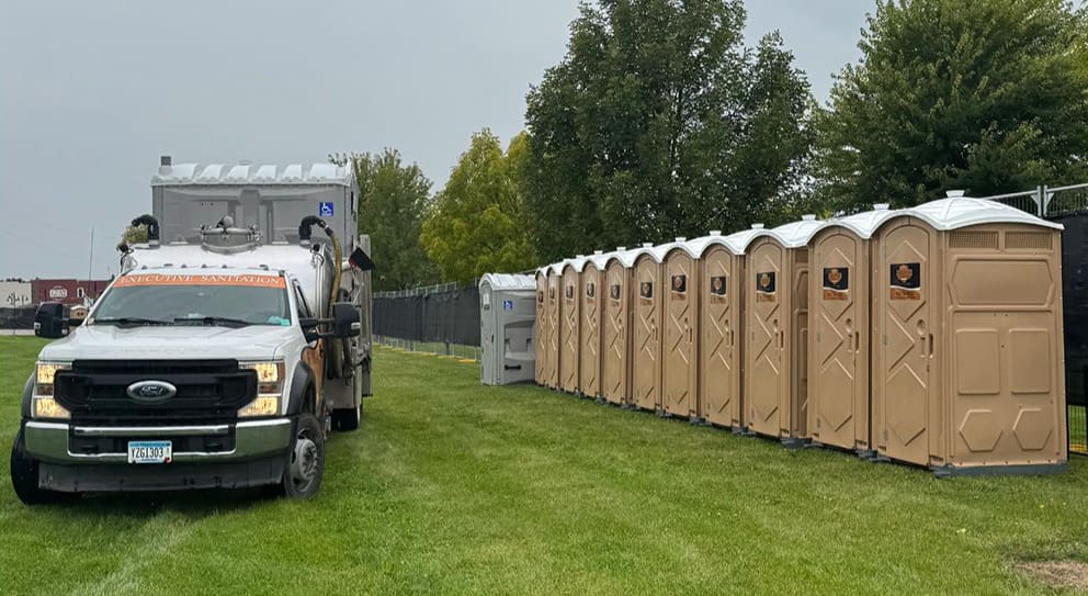Executive Sanitation truck servicing portable restrooms